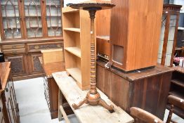 A 19th Century walnut candle stand having frilled top, and graduated turned column and trefoil base