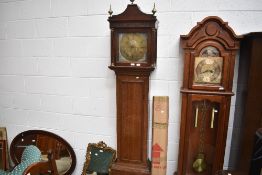 An 18th Century oak long cased clock having 30hr movement and brass dial named for T Savage,