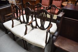 A nice set of six (four plus two) reproduction mahogany shield back dining chairs , having