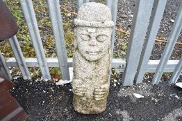 An ornamental totem style garden ornament