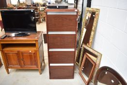 A modern mahogany effect four drawer filing cabinet