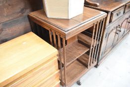An Edwardian oak revolving bookcase
