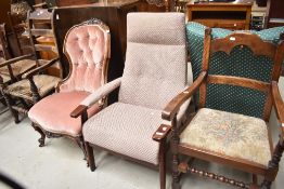 A vintage stained frame armchair, Parker Knoll or similar
