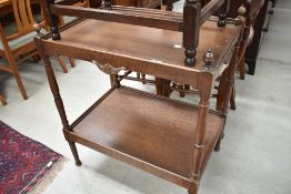 A mid 20th Century oak tea table (trolley style)