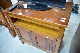 A modern hardwood TV cabinet