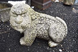 A garden ornament, modelled as dog of Fo or similar