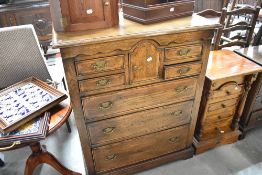 A good quality reproduction chest having door and drawer design, width approx. 84cm