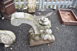 A reconstituted garden ornament