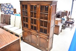 A nice quality reproduction bookcase, believed to be Titchmarsh and Goodwin