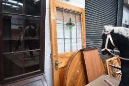 A pine and glazed door