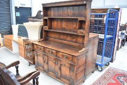 A nice quality period style oak dresser , probably Titchmarsh and Goodwin