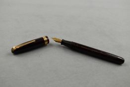 A Waterman 515 leverfill fountain pen in dark chocolate brown with broad band to the cap having a
