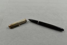 A Parker 51 fountain pen in black with steel cap. Approx 13.7cm