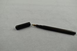 A Boots Dorothy eyedropper fountain pen in chaised black with clipless cap having Warrented nib.