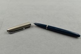 A Parker 51 fountain pen in blue with steel cap. Approx 13.7cm