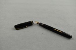 A Waterman Stalwart leverfill fountain pen in black with two narrow bands to the cap having Waterman