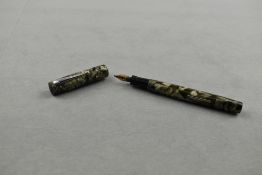 A Mabie Todd Swan leverfill fountain pen in grey marble having Blackbird 14ct nib. Approx 12.3cm