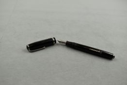 An Esterbrook leverfill fountain pen in black with single band to cap and having Esterbrook 2314M