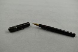An eyedropper 'The Swallow' fountain pen in BHR. Approx 14.8cm