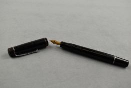 A Stephens 75 twist fill fountain pen in black with single band to the cap having a Stephens 14ct