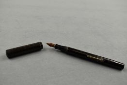 A Waterman Ideal leverfill fountain pen in BHR with clipless cap having Waterman Ideal nib. Approx