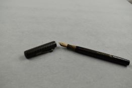 A Watermans Ideal leverfill fountain pen in BHR with chaised pattern having Waterman Ideal 2 nib.