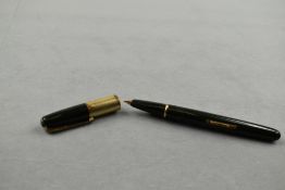 A Waterman 877 leverfill fountain pen in green with single very broad band to the cap having