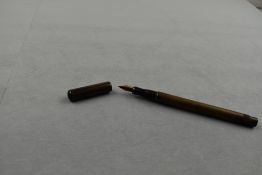 A De La Rue Onoto the Pen plunger fill fountain pen in BHR(discoloured) with clipless cap. Approx