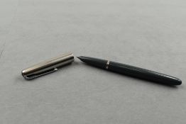 A Parker 51 fountain pen in grey with steel cap. Approx 13.7cm