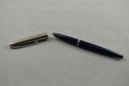 A Parker 45 Classic fountain pen in blue with steel cap. Approx 13.8cm