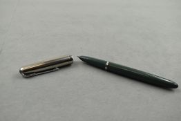 A Parker 51 fountain pen in dove grey with steel cap. Approx 13.6cm