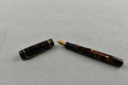 A Unique The Pen leverfill fountain pen in black/brown marble with two narrow bands to the cap