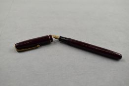 A Waterman W2 leverfill fountain pen in burgundy with single broad decorated band to the cap