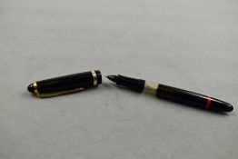 A Rotring Tintenkuli (TIKU) stylus piston fill fountain pen in black with single band to cap. Approx
