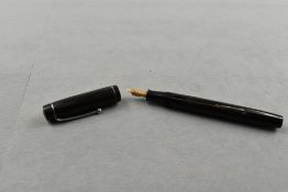 A Summit Cadet Model S100 leverfill fountain pen in black with single band to the cap (slight