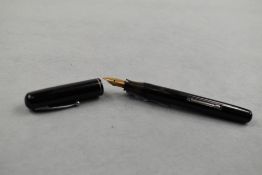 A Waterman Junior leverfill fountain pen in black with single narrow band to cap having Waterman