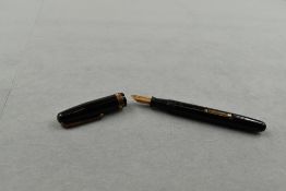 A Waterman 515 leverfill fountain pen in black with broad band to the cap having Waterman 5 cap.