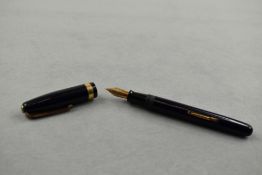 A Waterman 515 leverfill fountain pen in blue with single broad band to the cap having Waterman 5