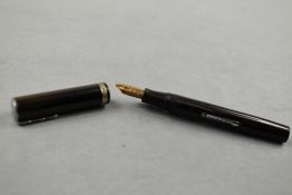 A Waterman Lady Patricia leverfill fountain pen in black with broad band to the cap having