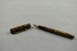A Valentine leverfill fountain pen in green hatched decal having Valantine 14ct nib. Approx 10.5cm