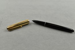 A Parker 51 fountain pen in black with gold cap. Approx 13.1cm