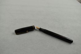 A Waterman Stalwart leverfill fountain pen in black with two narrow bands to the cap having