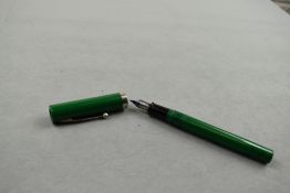 A Sheaffer No Nonsense Vintage cartridge fountain pen in green with broad band to the base of the