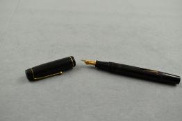A Stephens 106 leverfill fountain pen in black with single bands to the cap having a Stephens nib.