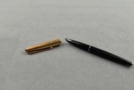 A Parker 61 fountain pen in black with gold cap. Approx 13.4cm
