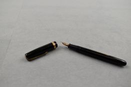 A Waterman W2 leverfill fountain pen in black with single broad decorated band to the cap having