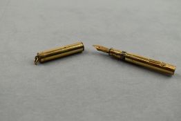 A Wahl Eversharp leverfill fountain pen in gold with ring top cap having Eversharp 2 nib. Approx 9.