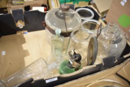A selection of glass wares including oil dispenser, decanter and storage jars