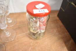 A selection of collectable coins and currency including coins and paper notes