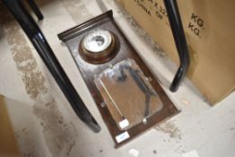 A mirror and barometer set